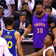 Image for article titled Drake Tries Very Hard To Pretend He Doesn't Have Steph Curry And Kevin Durant's Jersey Numbers Tattooed On His Body